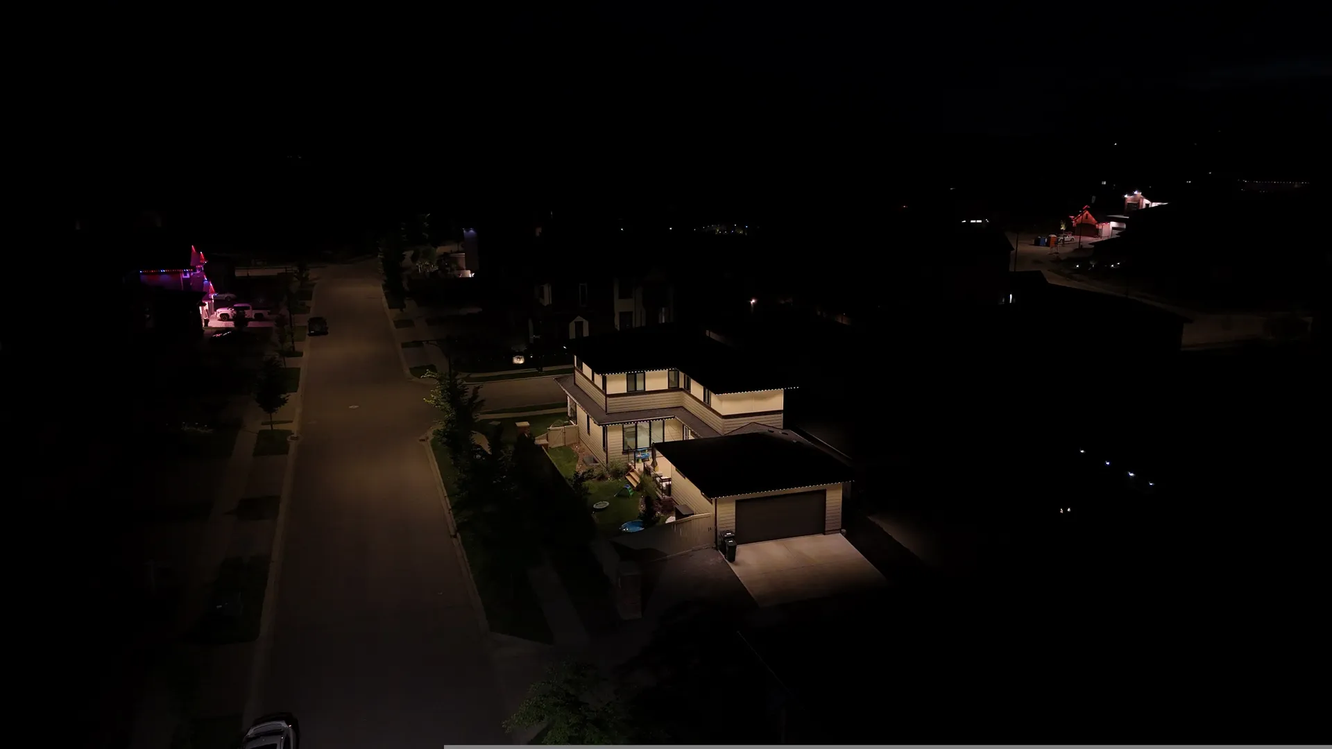Aerial view of permanent lighting on a new build in Leduc