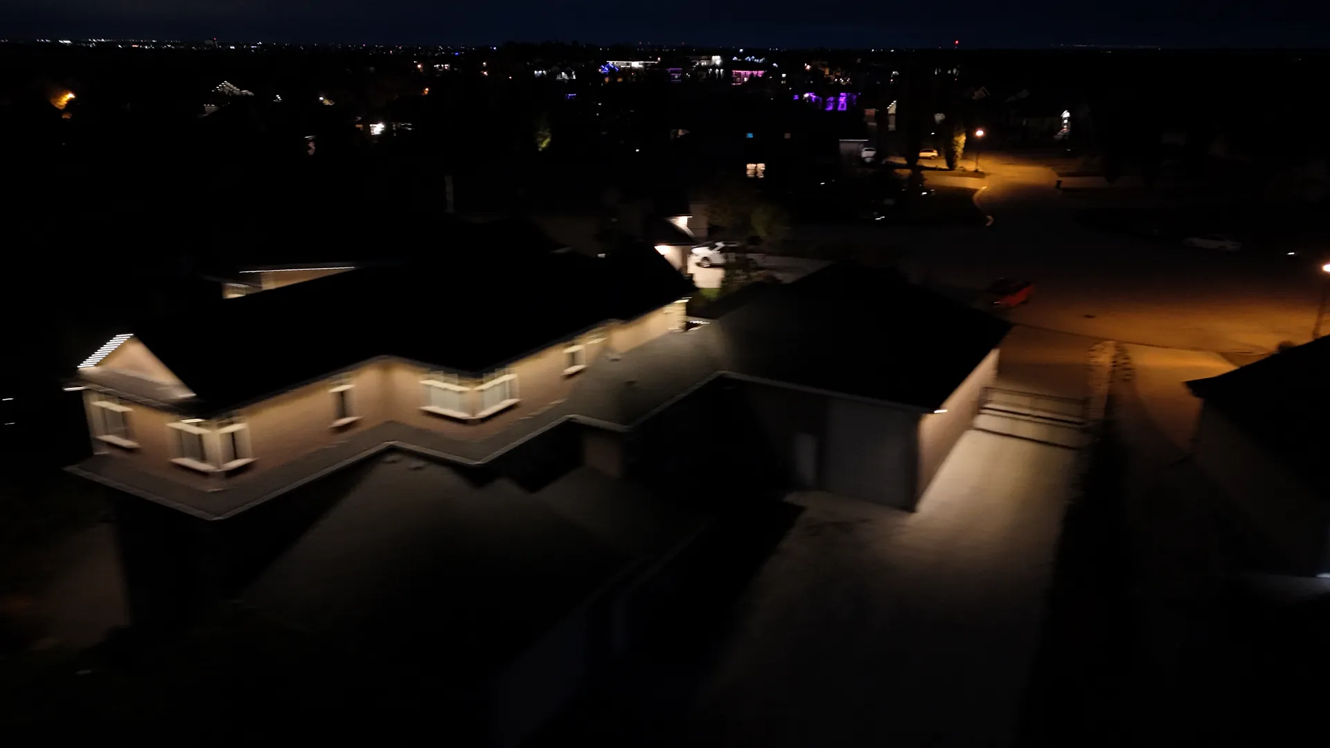 Aerial view of permanent roofline lighting in Edmonton, Alberta