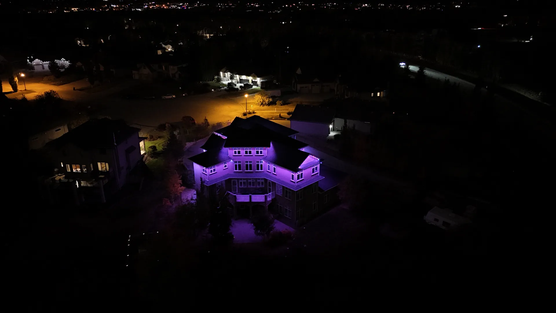 Purple LED lighting on a home roofline in Edmonton, Alberta